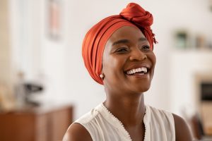 woman smiling, showing her teeth