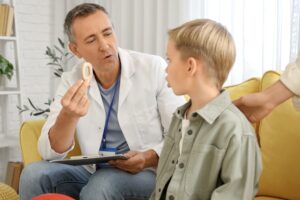 speech therapist with child